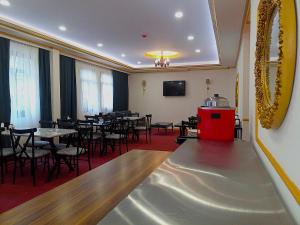 TV a/nebo společenská místnost v ubytování Global Termal Hotel