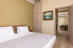 Posteľ alebo postele v izbe v ubytovaní Fani's Beach House