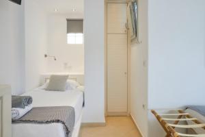 Posteľ alebo postele v izbe v ubytovaní Romantica Suites