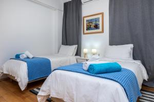 Rúm í herbergi á DIMITRA apartment with private pool and sea view -the ground floor of a two storey building