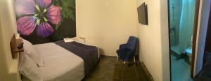 Postel nebo postele na pokoji v ubytování ENIGMA HOSTEL + 18 fotografií