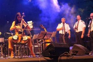 a group of people on a stage with a woman at Apartments Riva in Medulin +30 photos
