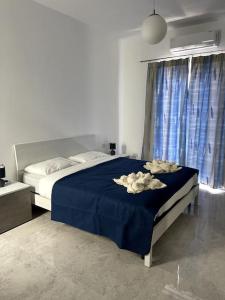 Cama o camas de una habitación en Apartment, Few Steps from Ghadira Bay