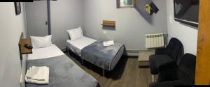 Ліжко або ліжка в номері ENIGMA HOSTEL
