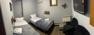 Ліжко або ліжка в номері ENIGMA HOSTEL