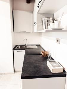 Kuchyň nebo kuchyňský kout v ubytování Sentimento Luxury Rooftop