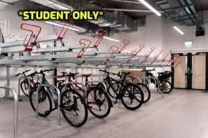 a bunch of bikes parked in a garage at Student Only Zeni Ensuite Rooms Belfast in Belfast