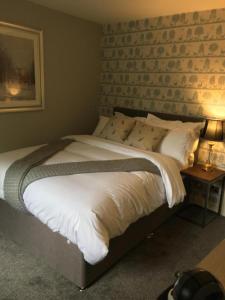 Krevet ili kreveti u jedinici u objektu OYO Auldgirth Inn