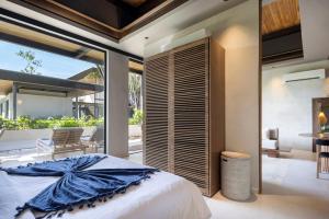 Posezení v ubytování QUIN Surf Residence Nosara