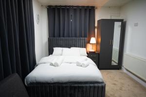 Digbeth Aparthotel客房内的一张或多张床位