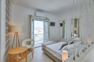 Posteľ alebo postele v izbe v ubytovaní Romantica Suites