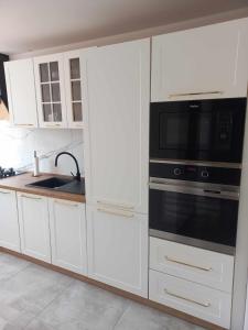 Η κουζίνα ή μικρή κουζίνα στο Apartament blisko Rynku