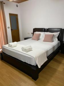 Postel nebo postele na pokoji v ubytování Bertis guest house