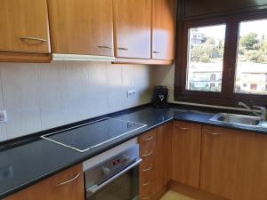 A kitchen or kitchenette at 5594 Apartment in Llançà