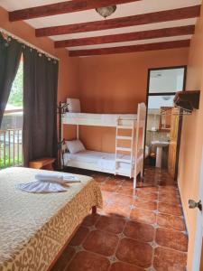 Ένα ή περισσότερα κρεβάτια σε δωμάτιο στο Apartahotel Playa Luna