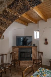 TV a/nebo společenská místnost v ubytování Home at Calascio
