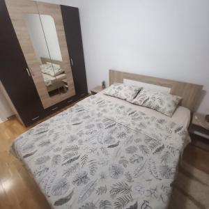 Postel nebo postele na pokoji v ubytování Apartman MG