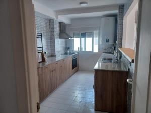 Η κουζίνα ή μικρή κουζίνα στο Ático en Estepona, Malaga