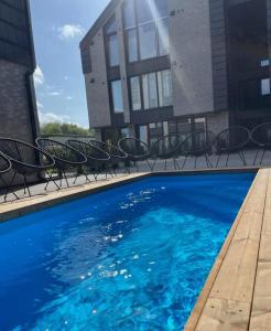 Bazén v ubytování Vėjų Vėjai nebo v jeho okolí