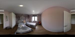 Łóżko lub łóżka w pokoju w obiekcie Apartamentos La Chaparrina del Jerte
