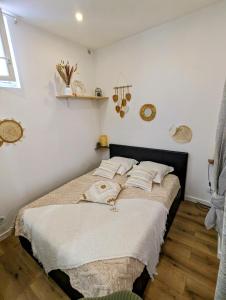 Posteľ alebo postele v izbe v ubytovaní Appartement cosy proche du port