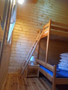 Postel nebo postele na pokoji v ubytování Domki Monte Kristo