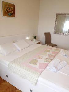 Postel nebo postele na pokoji v ubytování Apartment Kata