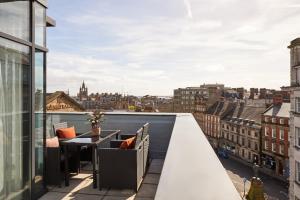 a balcony with a view of a city at Hotel Indigo Newcastle, an IHG Hotel in Newcastle upon Tyne