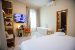 Postel nebo postele na pokoji v ubytování Vespucci Palace Roma
