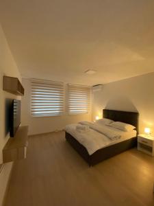 Ένα ή περισσότερα κρεβάτια σε δωμάτιο στο Apartment Diletta