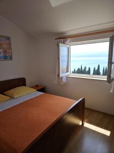 Fotografia z galérie ubytovania Apartment in Duce with sea view, balcony, air conditioning, W-LAN 5067-4 v destinácii Duće