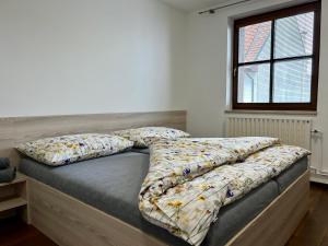 Postel nebo postele na pokoji v ubytování Apartmány Strážnice