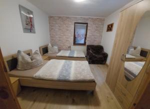 Postel nebo postele na pokoji v ubytování Ferienwohnung Schlothauer 1