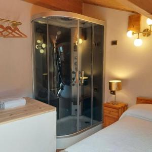 A bed or beds in a room at B&B La Soldanella