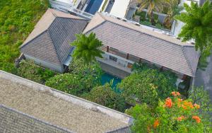 an overhead view of a house with trees and plants at Dirga's House Sanur View by EPS in Sanur