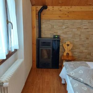 A bed or beds in a room at B&B La Soldanella
