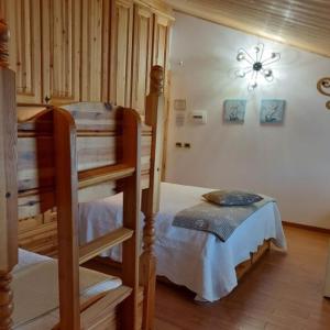 A bed or beds in a room at B&B La Soldanella