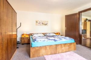 Ein Bett oder Betten in einem Zimmer der Unterkunft Chalupa Kukajda