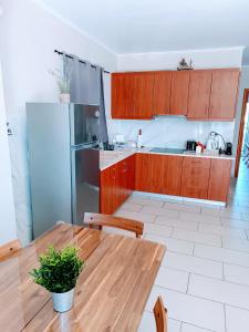 A kitchen or kitchenette at Hermione Port Luxury Residence