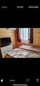 Ένα ή περισσότερα κρεβάτια σε δωμάτιο στο Tosic