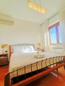 Ένα ή περισσότερα κρεβάτια σε δωμάτιο στο la-casa-di-alice