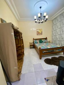 Ένα ή περισσότερα κρεβάτια σε δωμάτιο στο Chez Danie