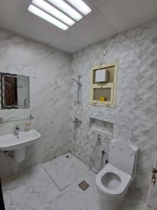 Gallery image of Aalia building studio furnished flat in Al Ḩamīdīyah +1 photo