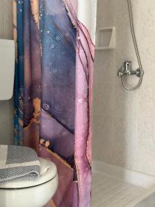 A bathroom at Venus Rooms