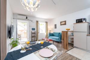 Kuchyňa alebo kuchynka v ubytovaní Apartments Marivo Lapad