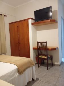 Voodi või voodid majutusasutuse Mariachis Hotel toas