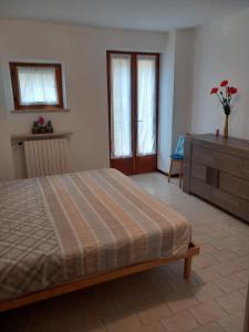 Postel nebo postele na pokoji v ubytování Al Porto low cost