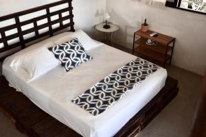 RUSTICO LOUNGE-Property in front of the beach客房内的一张或多张床位