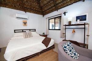 RUSTICO LOUNGE-Property in front of the beach客房内的一张或多张床位