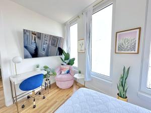 a bedroom with a desk and a chair at Large One Bedroom - Massive Private Terrace - Luxury Building - Williamsburg - Greenpoint in Brooklyn
